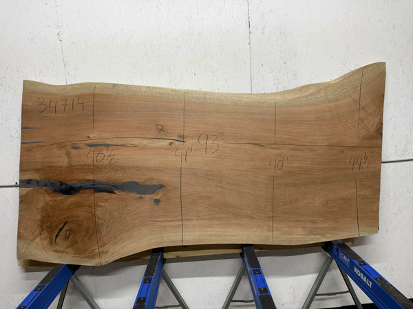 Wooden slab with measurements on a white background